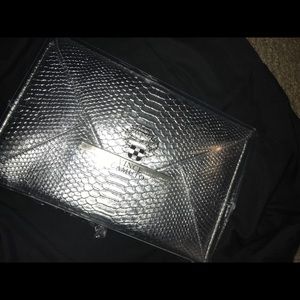 Vince Camuto Silver pouch still in wrappings! New
